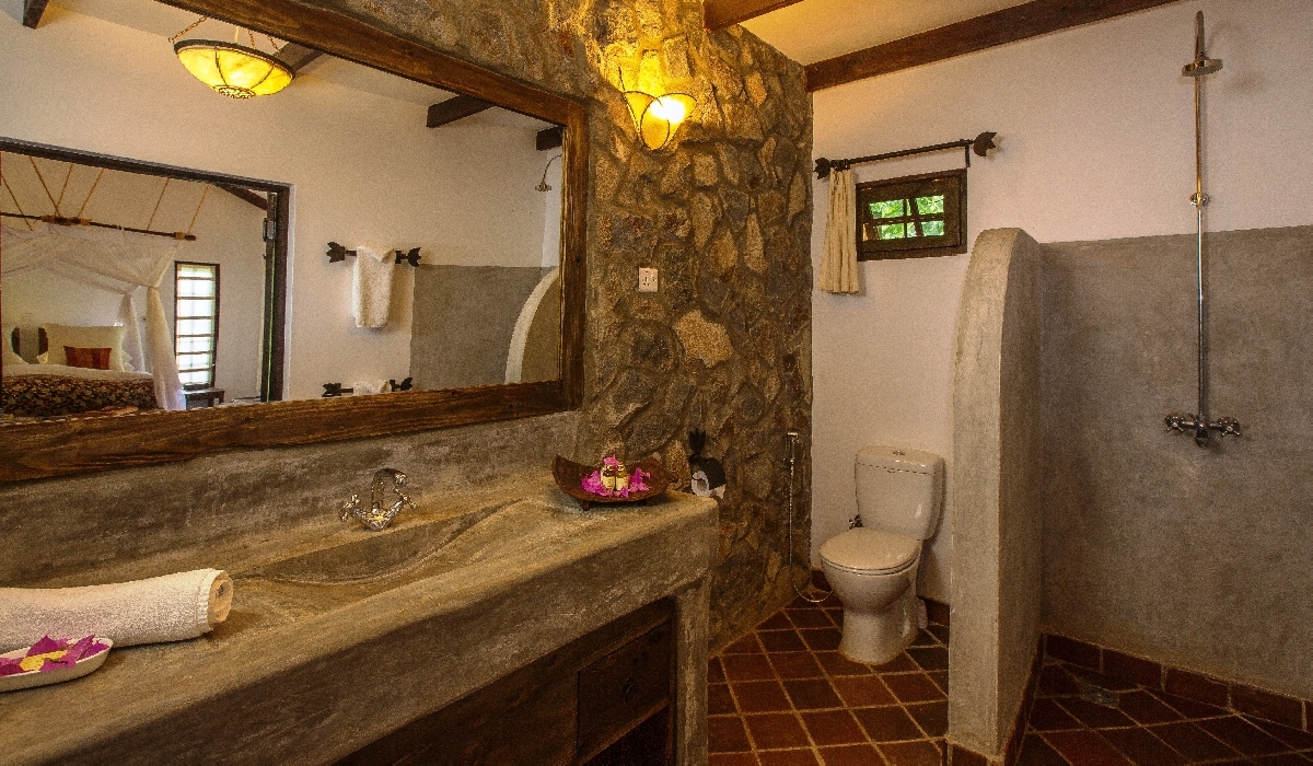 Salle de bain dans un cottage du River Trees Inn